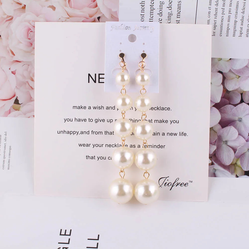 Pearl String Clip on Earrings