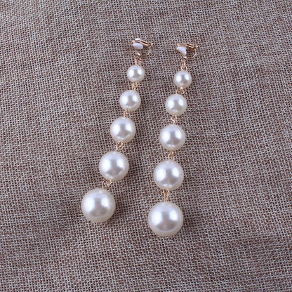 Pearl String Clip on Earrings